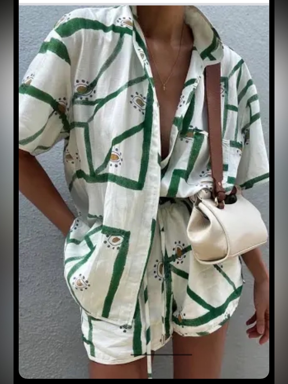 New! Commense XS abstract eye geometric print shorts set in green and cream.